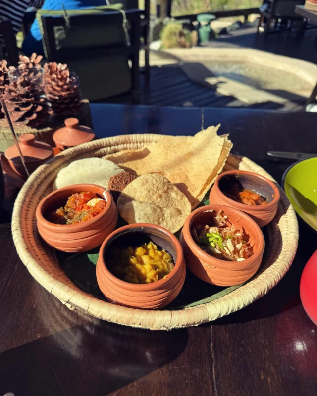 What a stunning Omani breakfast at the @alilajabalakhdar and just look at that view! #foodietravel #oman #breakfast #breakfastwithaview #mountains #omanifood #eatlocal